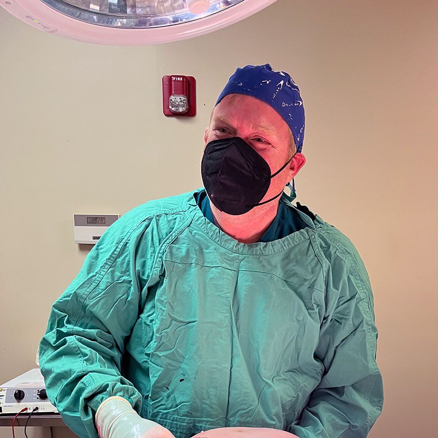 Veterinarian Surgery veterinarian scrubbed up for surgery